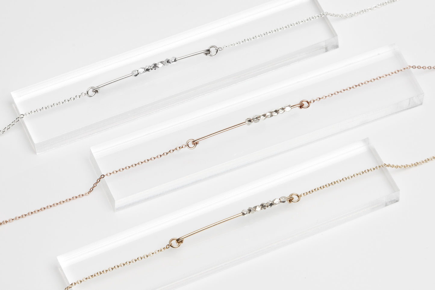 Skinny Bar Bracelet with Tiny Silver Faceted Beads