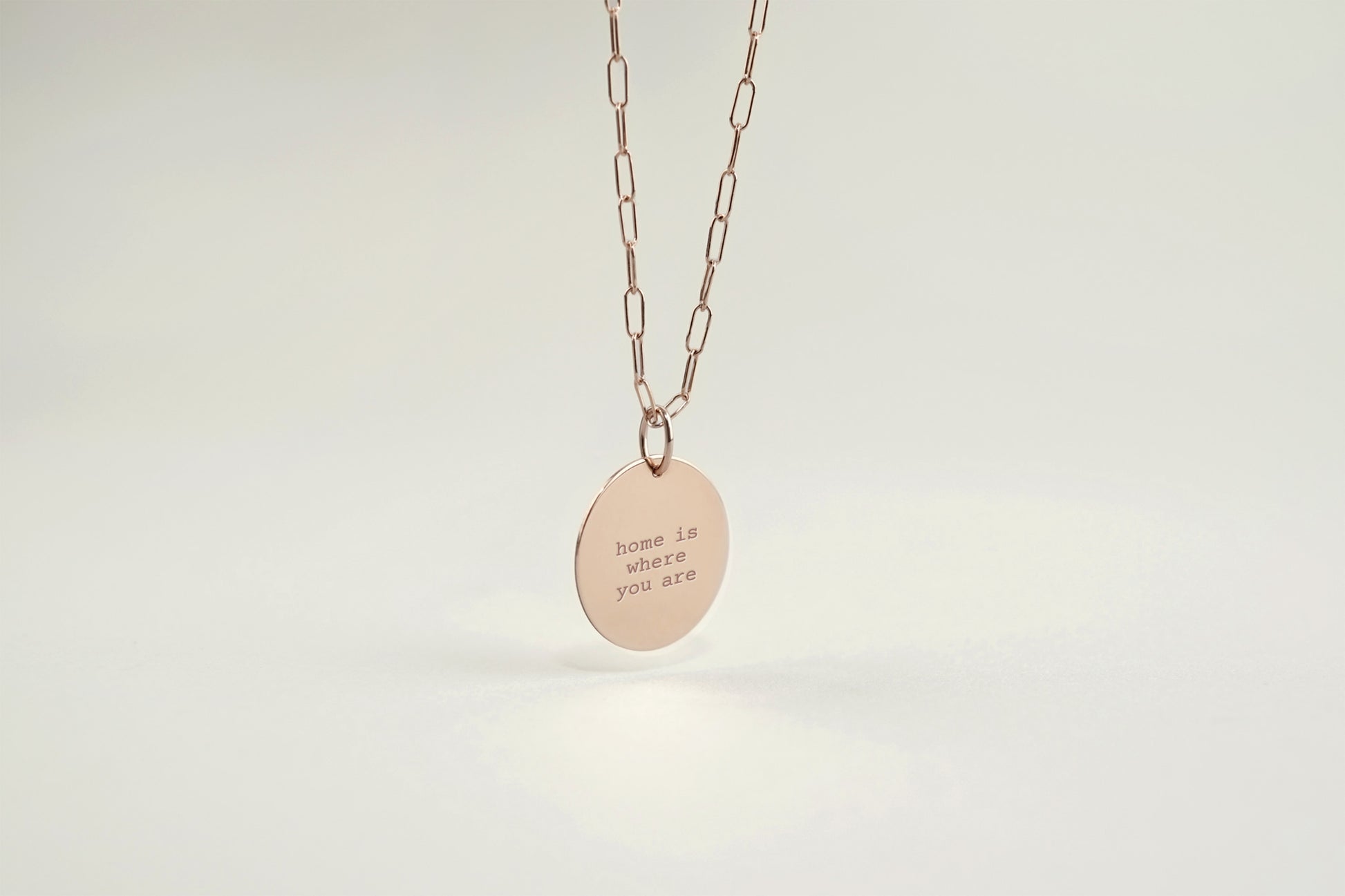 Necklace with a pendant on a light gray background