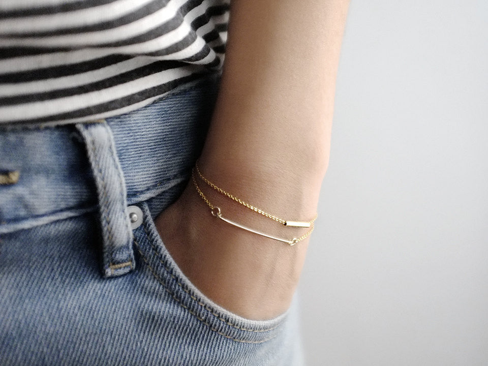 Model with LITTIONARY 14K Gold Filled Dainty Skinny Bar Bracelet